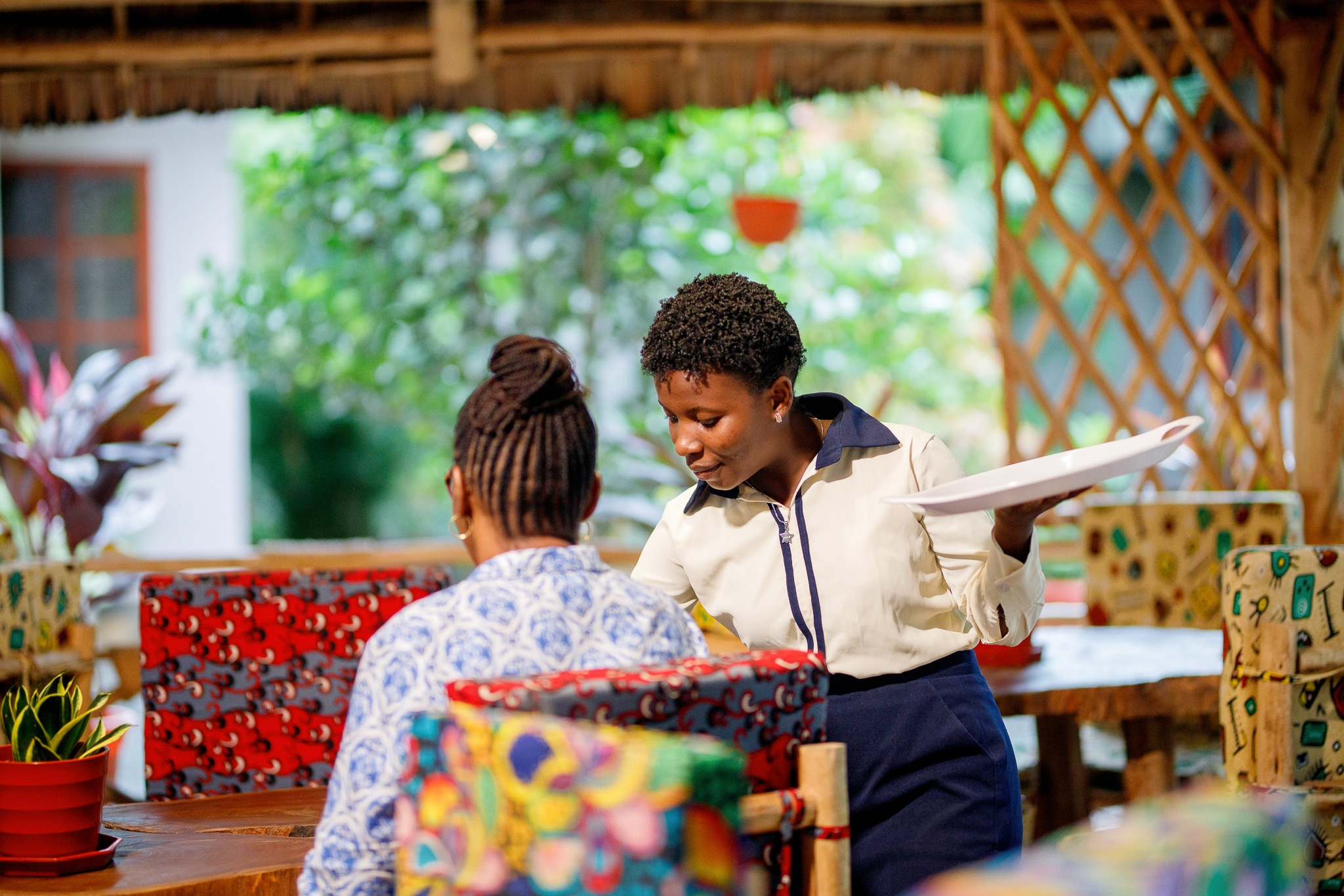 Staff serving customers at traditional restaurant
